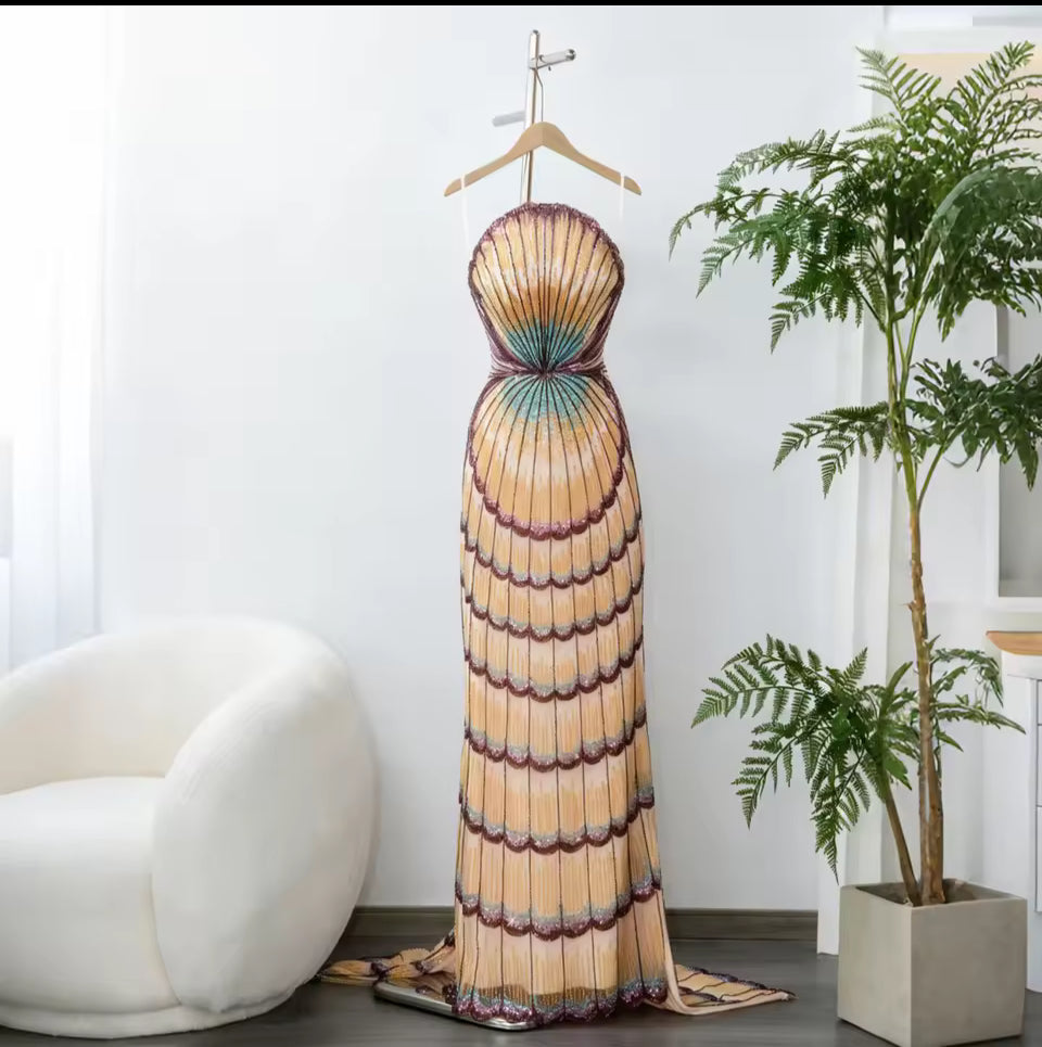 Celestial Shell Couture Gown — hand-beaded strapless evening gown with iridescent shell motif in champagne gold, rose, and aquamarine